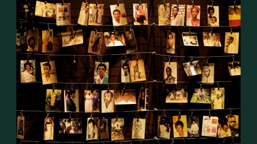 Family photos of some of those who died hang on display in an exhibition at the Kigali Genocide Memorial centre in the Rwandan capital, Kigali, on April 5, 2019. Rwanda commemorated the 25th anniversary of the country's descent into extreme violence when 