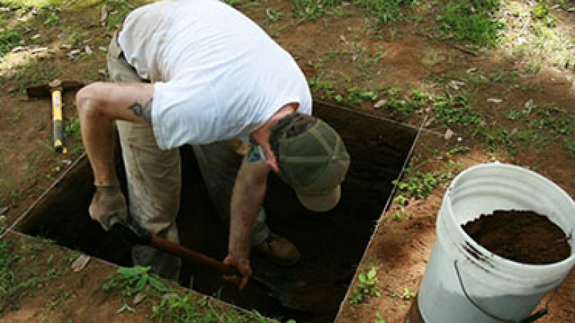 Getting his hands dirty in Nicaragua, Colin Quinn ’15 excavates a small plot that yielded an array of artifacts. (Photo by Jason Paling)