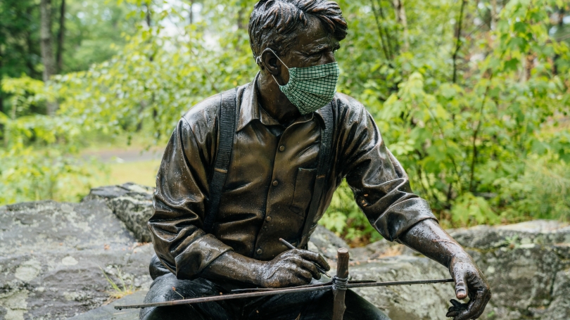 Robert Frost Statue on Dartmouth Campus with Mask